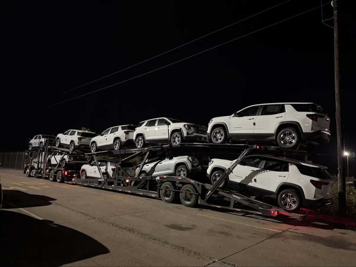 MOV MY CAR carrier hauling SUVs at night on the San Antonio to Houston car transport lane