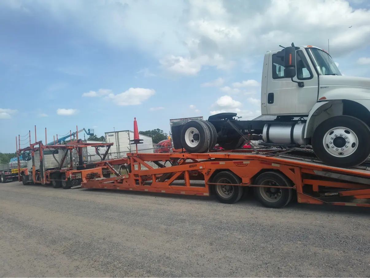 MOV MY CAR tractor and trailer staged for a San Antonio to Austin vehicle move