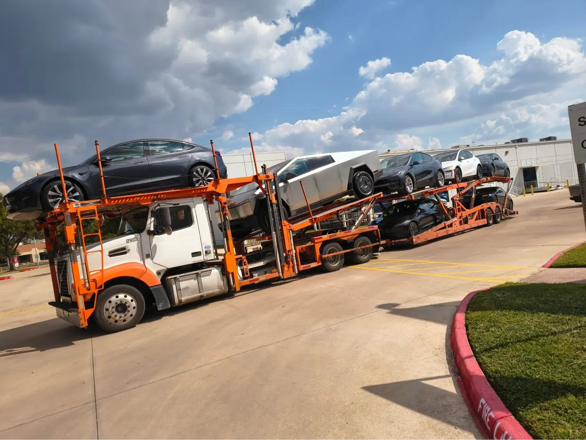 MOV MY CAR carrier loaded with Teslas on the Austin to Houston car transport lane